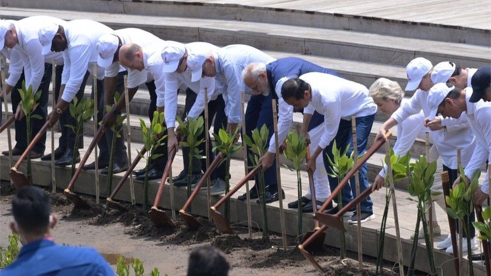 President Joko Widodo with the G20 head of states and international organisation leaders plant mangrove in a series of the G20 Summit activities at Ngurah Rai Forest Park (Tahura), Denpasar, Bali, Indonesia, November 16, 2022.
