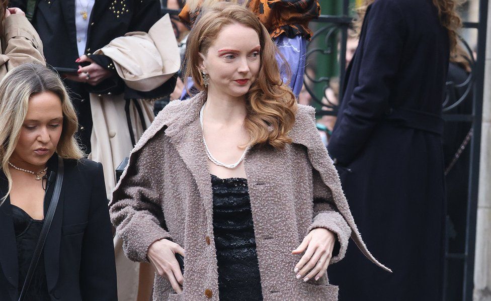 Lily Cole arrives for a memorial service to honour and celebrate the life of fashion designer Dame Vivienne Westwood at Southwark Cathedral, London,