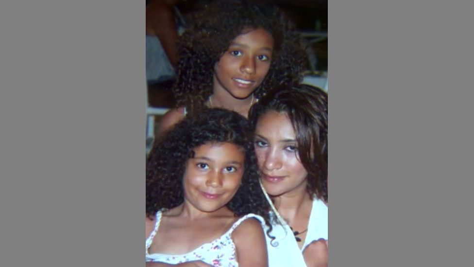 Mina Dich with her daughters, Safaa (in front) and Rizlaine