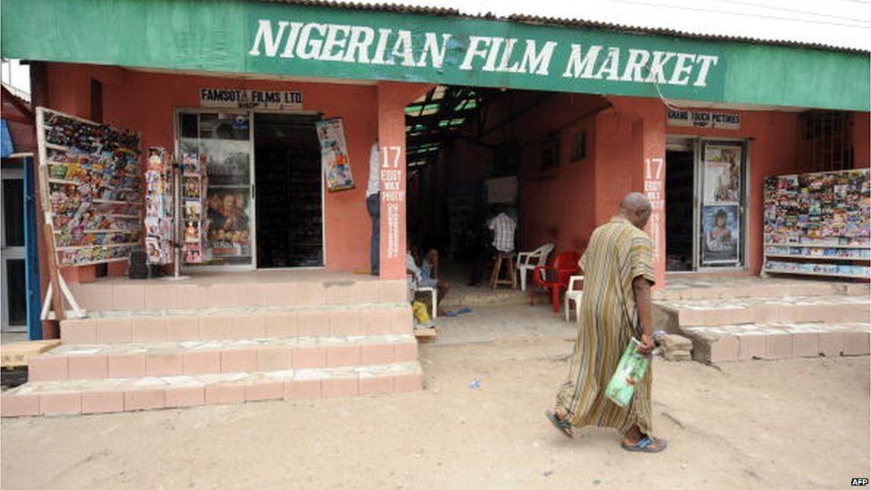 A man walks past the entrance of the Nigerian film market in Lagos on March 26, 2010.