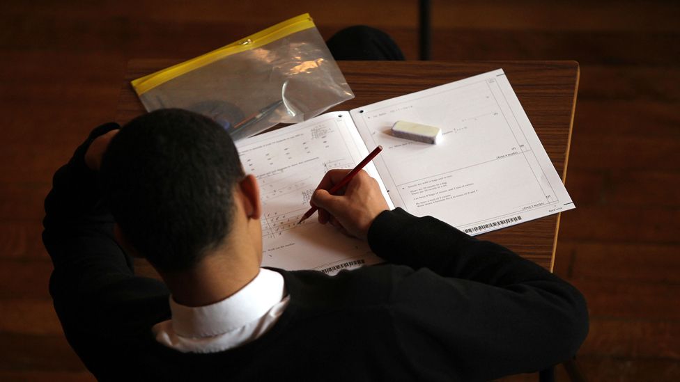 Teenager taking an exam