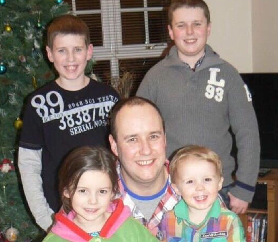 Ian Molyneux with his children