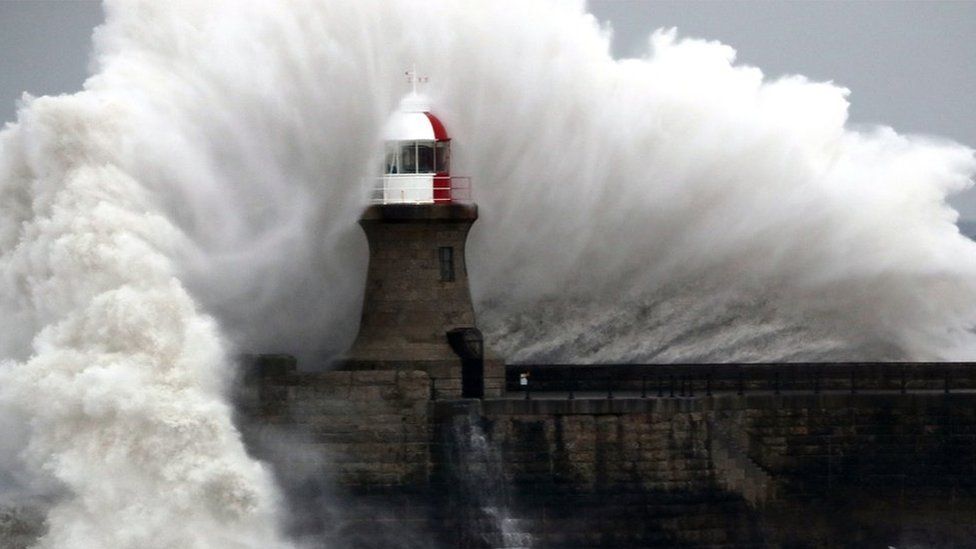 Giant waves crash over Souter Lighthouse in South Shields in Tynemouth
