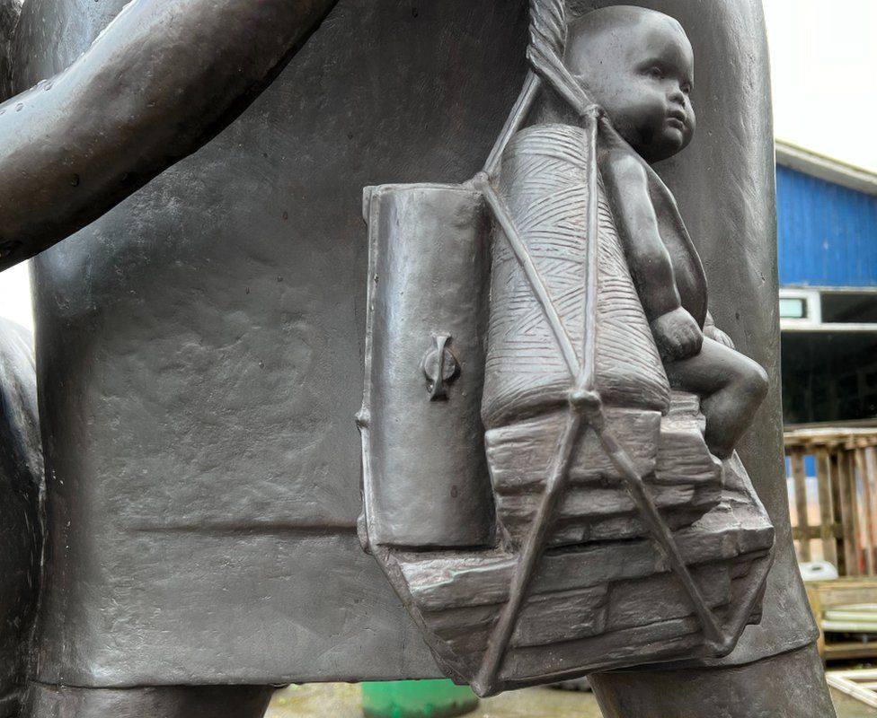 Mother and Child statue bag after restoration