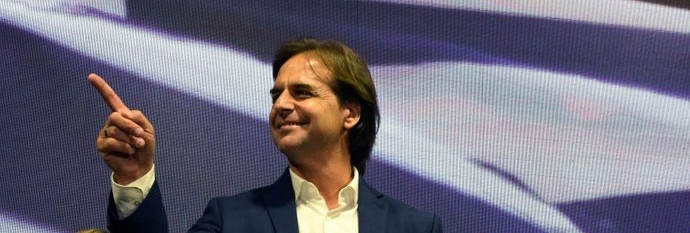 The presidential candidate for Uruguay's Partido Nacional party, Luis Lacalle Pou gestures while addressing supporters in Montevideo after polls closed