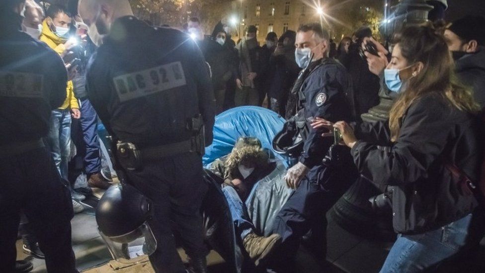 Paris police clashing with migrants at Place de la République, Paris, 24 Nov 20