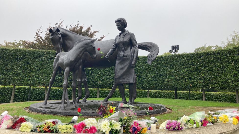 Flowers laid at the statue of the Queen in Newmarket