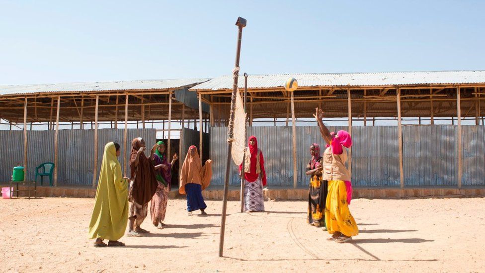 Young girls play volleyball outside a youth nutrition centre run by Save the Children at Mekladida refugee camp in the Somali region of Ethiopia on December 19, 2017. The camp currently houses more than 34,000 Somali refugees, where 67% of that population is below the age of 18. Most of the refugees have fled due to conflict and famine in their home country, Somalia, the border with Ethiopia being just 100km from the camp.