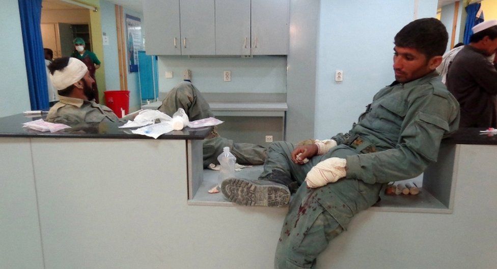 Afghan police who were injured in a suicide bomb attack that targeted a police post, receive medical treatment at a hospital in Paktia, Afghanistan, on 17 October 2017.