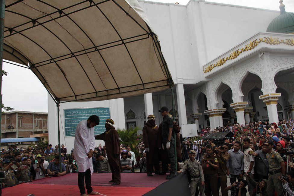 Two men are caned in Indonesia's Aceh province for gay sex (23 May, 2017).