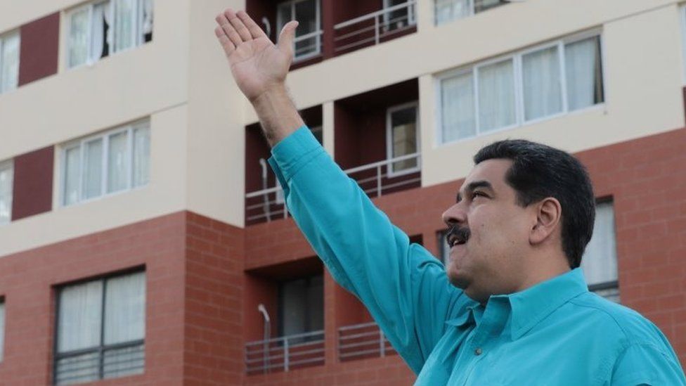 A handout photo made available by the Miraflores Press shows Venezuelan President Nicolas Maduro gestures during a government event in Caracas, Venezuela, 27 December 2017.