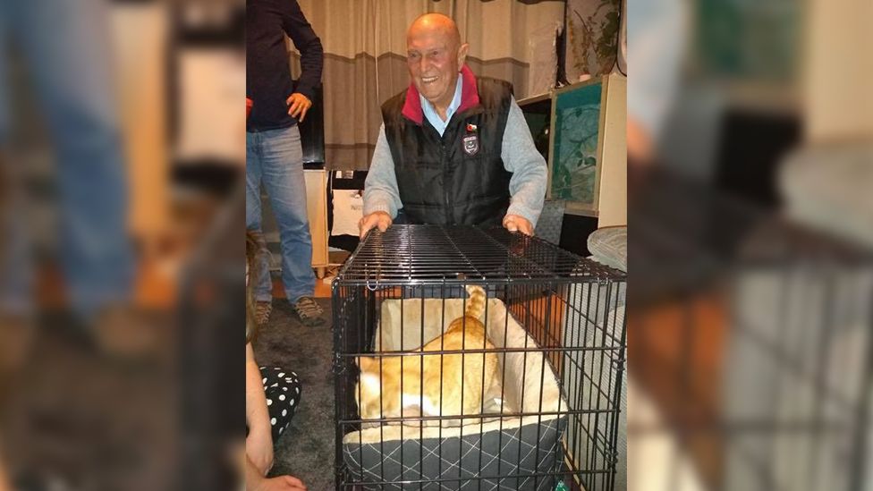 Jeffrey Otway being reunited with his cat Tiger