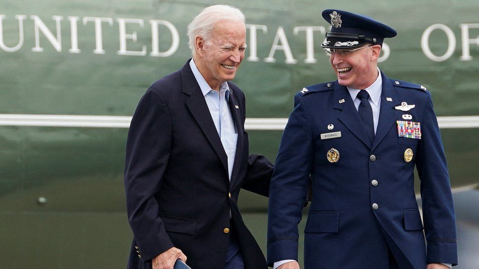 US President Joe Biden walks as he is escorted to Air Force One, before departing for Britain from Dover, Delaware, U.S., July 9, 2023.