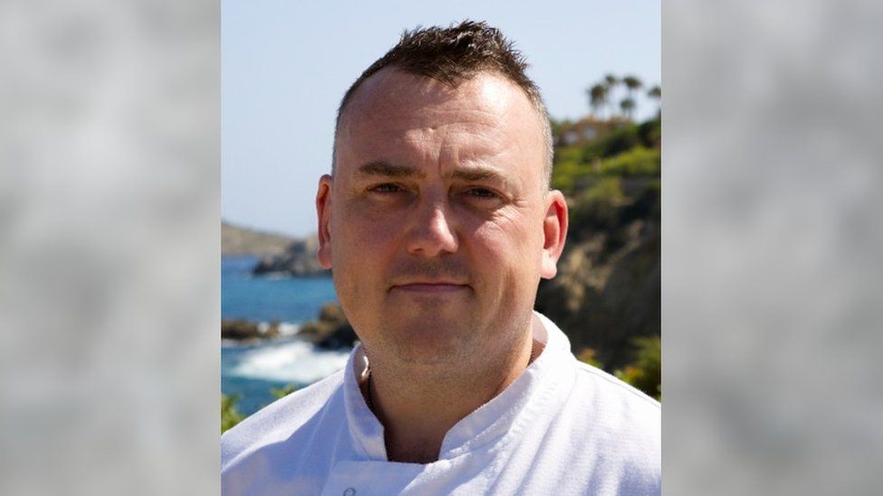 A chef in a uniform