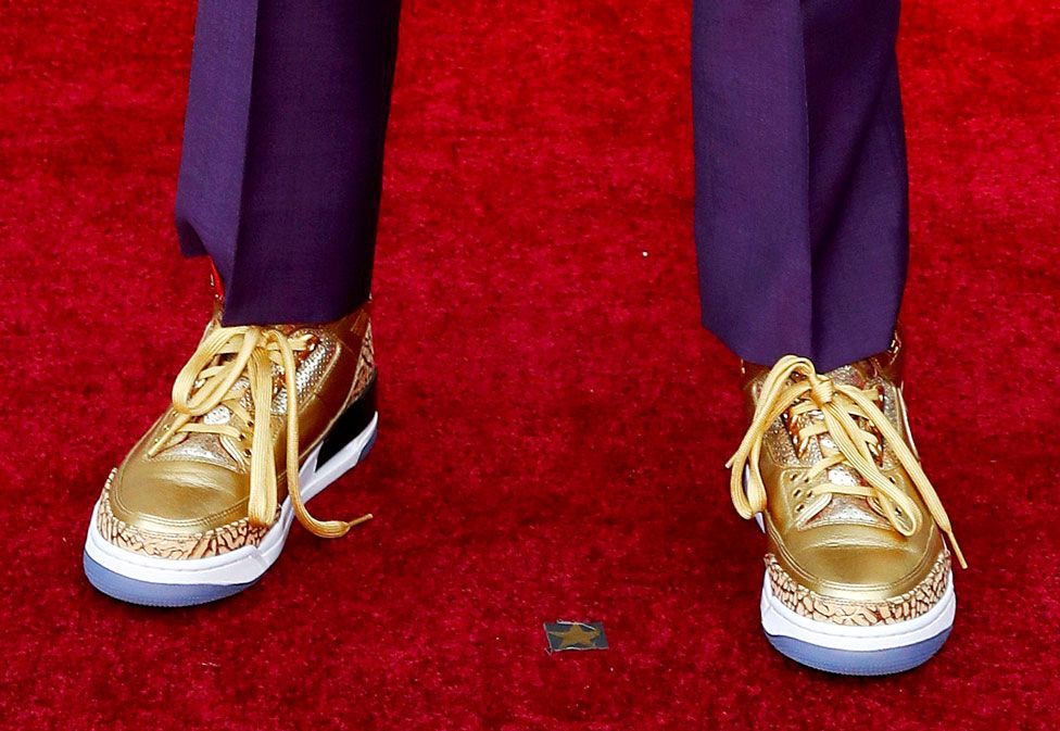 Gold shoes on the red carpet
