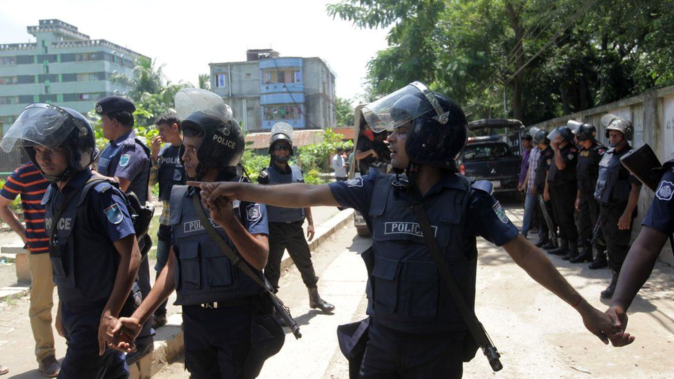 Bangladesh police stand guard at the scene of an operation to storm a militant hideout in Narayanganj, some 25km south of Dhaka on August 27, 2016