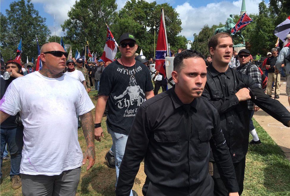 Four men pictured in Charlottesville, gathered for the "Unite the Right" rally.