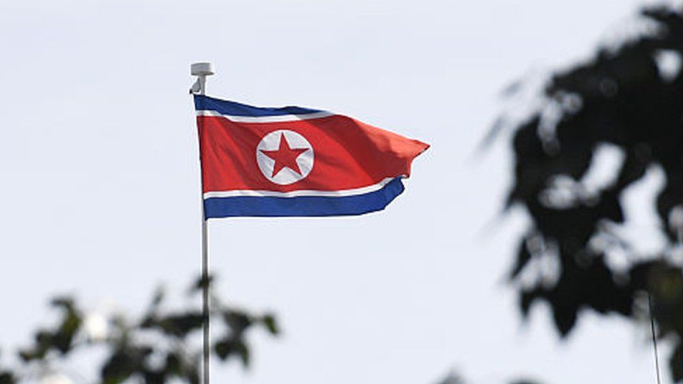 The North Korean flag flies above the North Korean embassy in Beijing