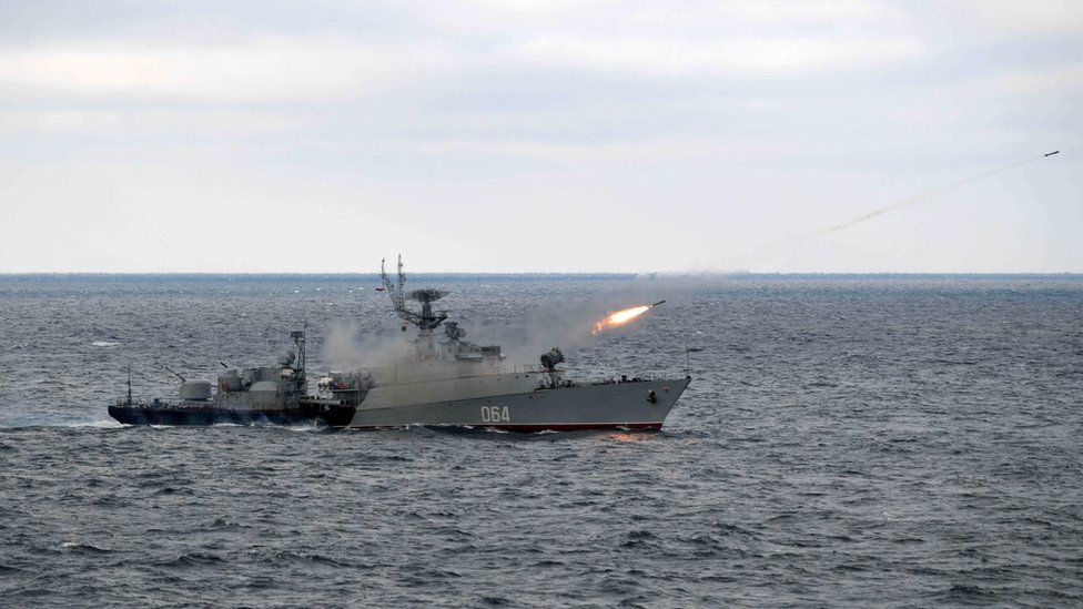 A Russian ship fires a missile during drills in the Black Sea