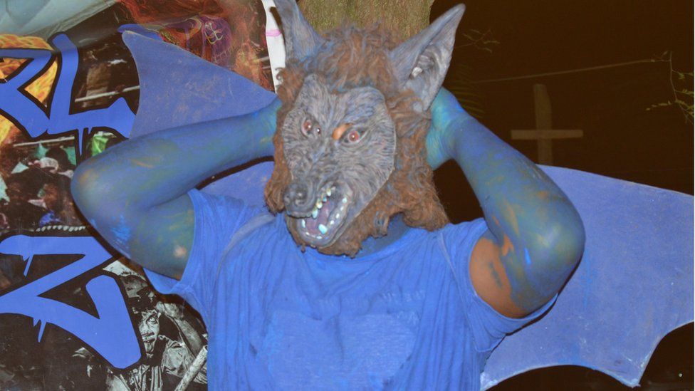 Leonardo Joseph in a wolf mask