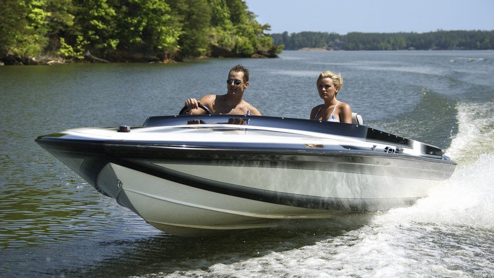 Couple in speedboat