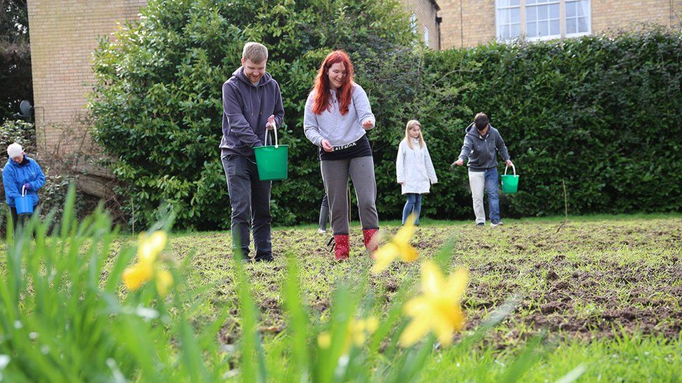 Students sowing a wildlife meadow