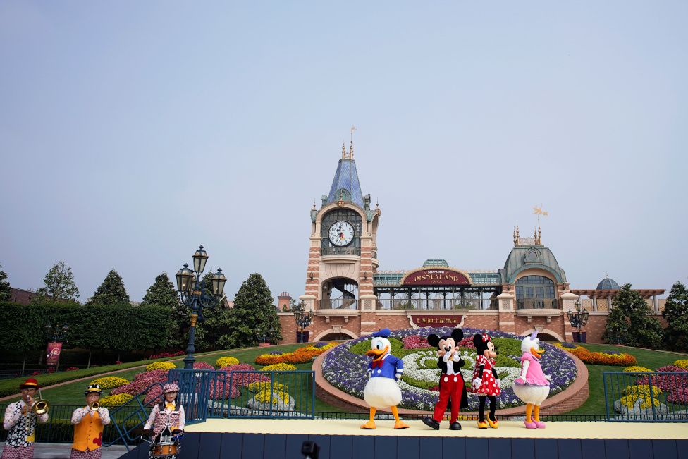 Performers in a ceremony marking the reopening of Shanghai Disneyland