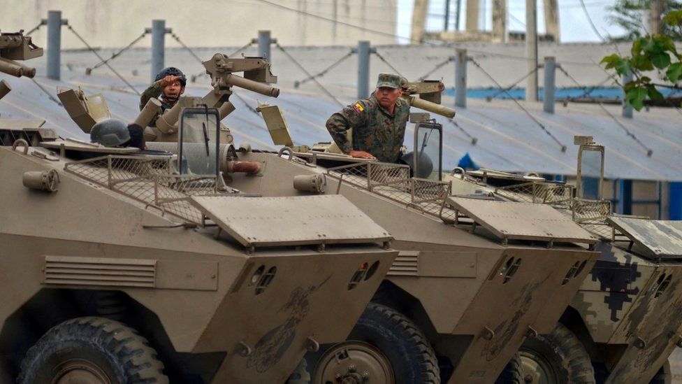 Soldiers in armoured vehicles secure the Guayas 1 prison in Guayaquil, Ecuador