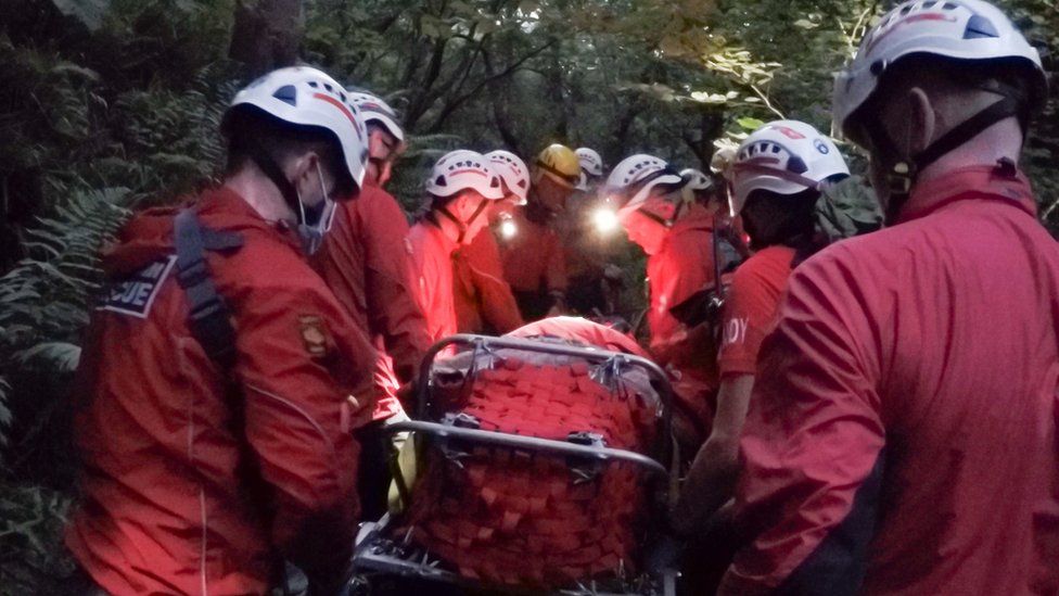 Rescuers carrying the casualty