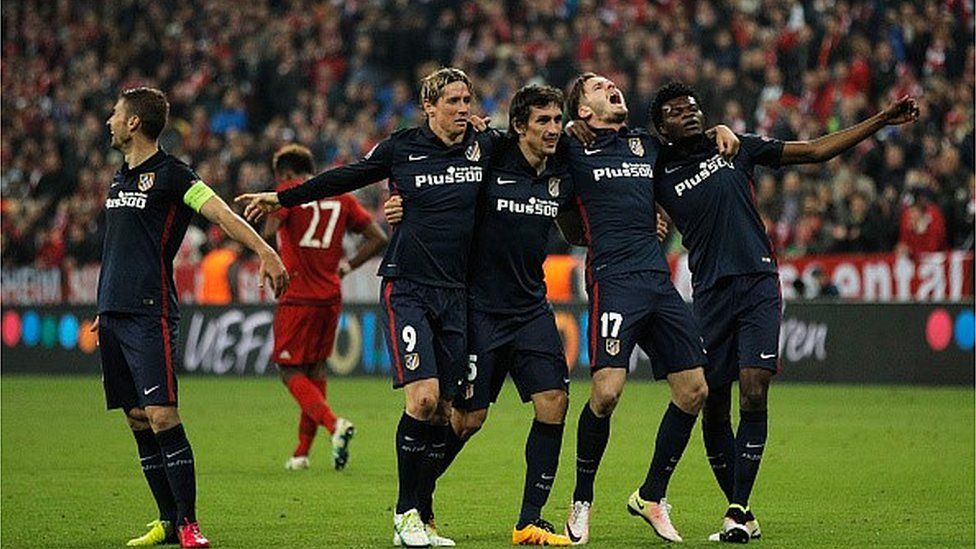 Atletico Madrid celebrate beating Bayern Munich in the European Cup semi final