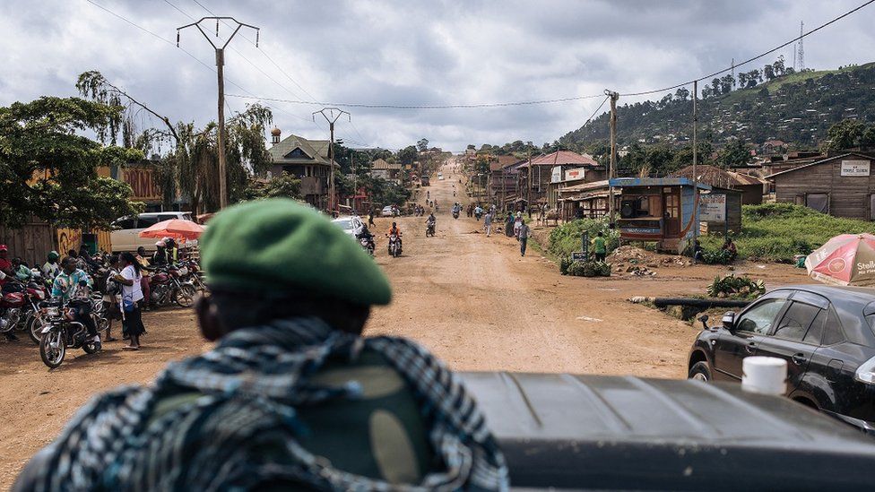 Congolese soldiers drive along the road from Beni to the Ugandan border, 80 kilometers east, northeastern Democratic Republic of Congo, on May 23, 2021.