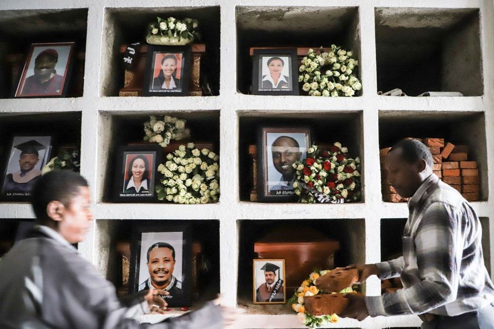 Portraits of victims of the Ethiopian Airlines flight crash are displayed during a mass funeral at Holy Trinity Cathedral in Addis Ababa, Ethiopia, on 17 March 2019.