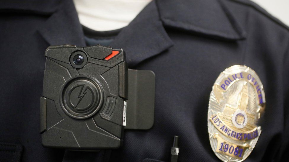 In this 15 January, 2014, file photo a Los Angeles Police officer wears an on-body camera during a demonstration in Los Angeles