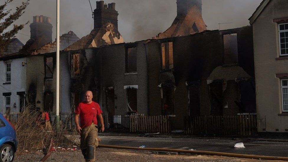 Firefighters at the scene of a blaze in the village of Wennington, east London