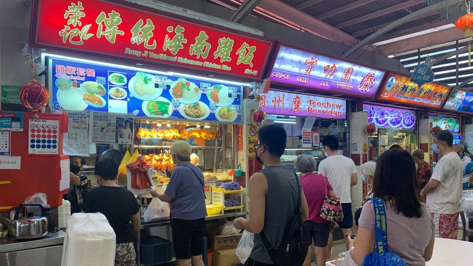Queues at a chicken rice stall in Singapore.