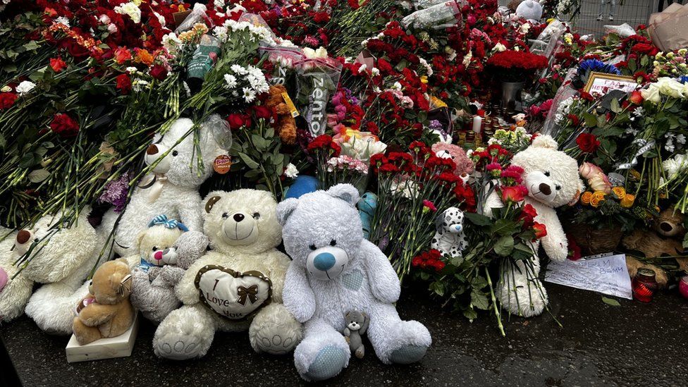 People left flowers and teddy bears in tribute of the people killed in the Crocus City Hall in Moscow
