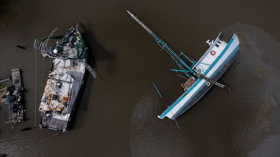 Capsized boat on the Bayou Lafourche in Galliano