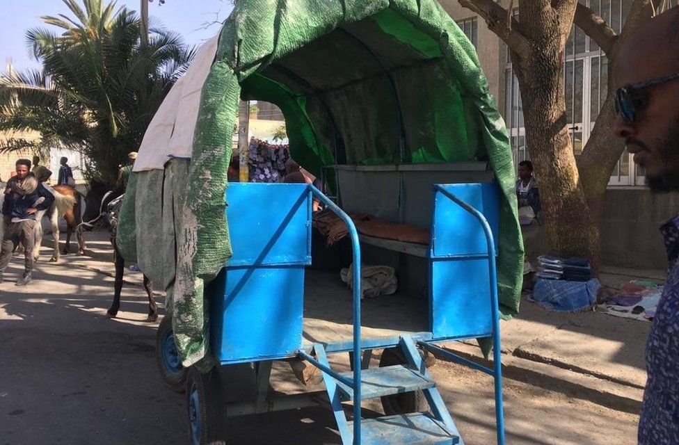 The back of a donkey-drawn cart