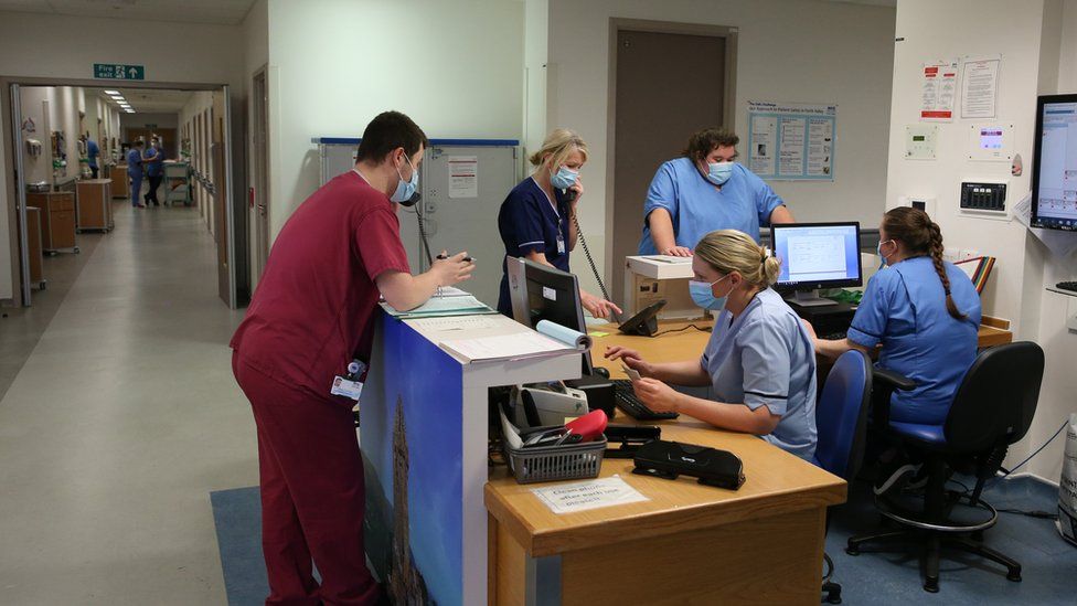 British medical staff / nurses working inside a busy A&E / Accident and Emergency department in a UK hospital, Stirling, Jan 2021