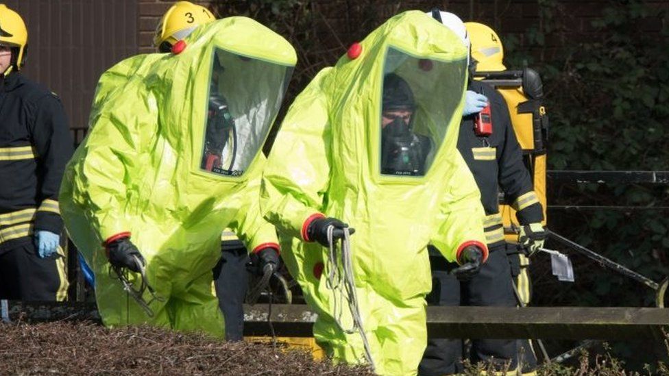 Officers in masks and jumpsuits after the nerve agent attack in Salisbury