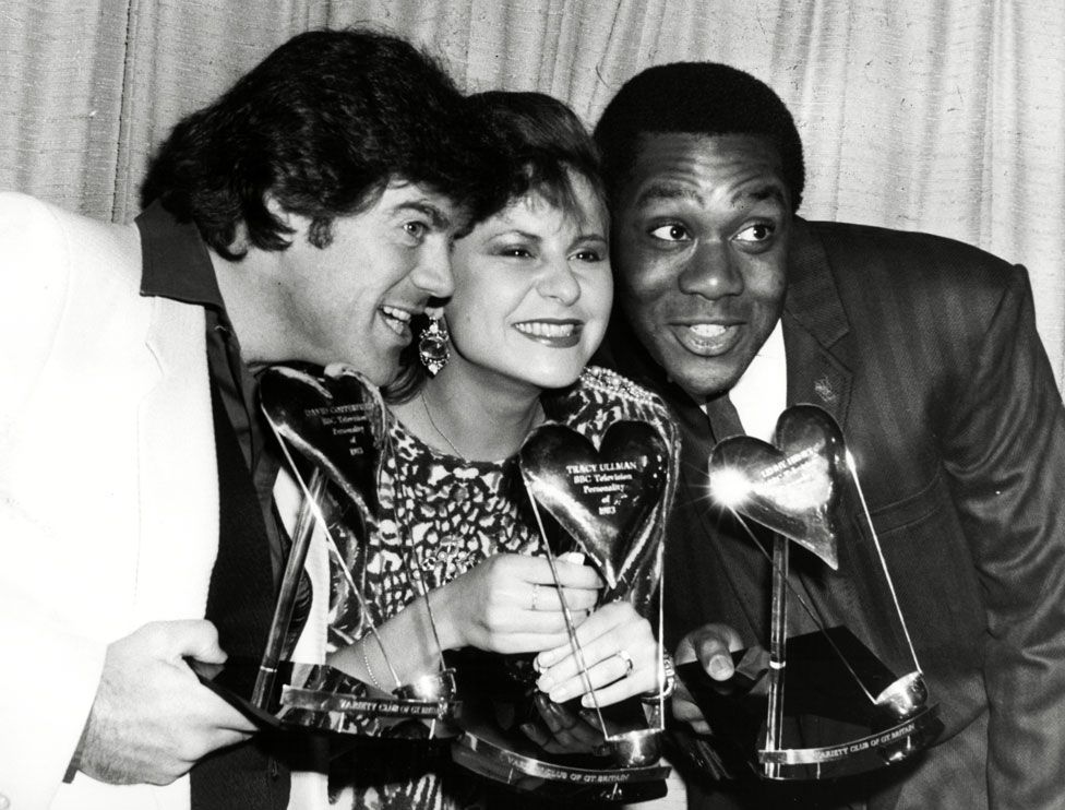 Comedians David Copperfield, Tracey Ullman and Lenny Henry with their awards for TV show 'Three of a Kind' at the Variety Club Awards in 1984