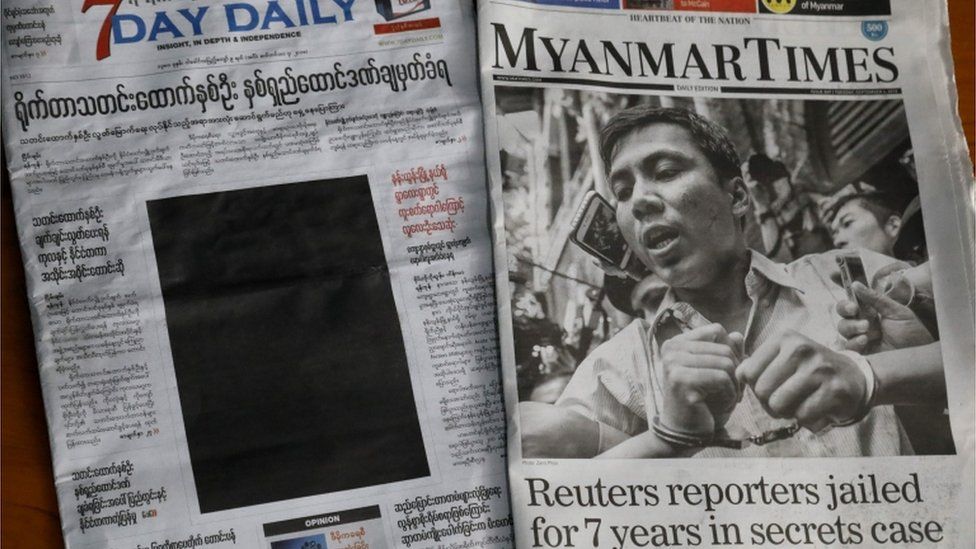 A black front page of 7Day daily and the Myanmar Times newspaper, showing the fall of press freedom in Myanmar