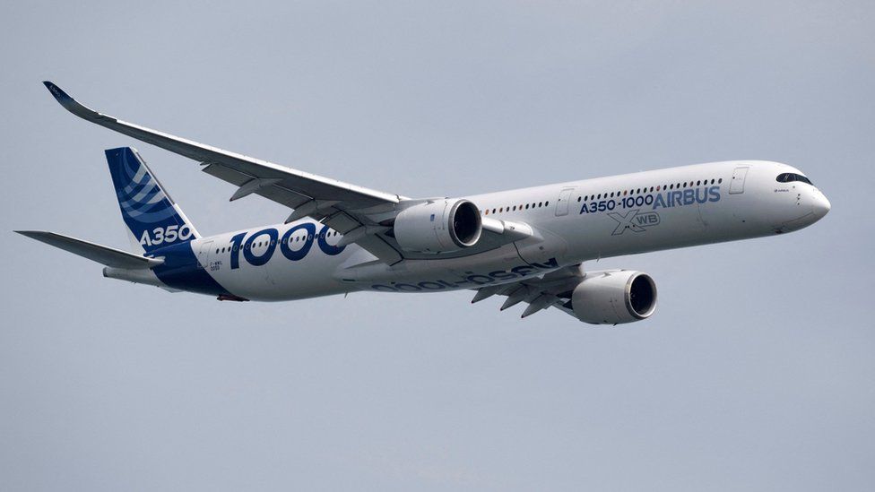 The Airbus A350-1000 seen in the aerial display during the media preview of the Singapore Airshow in Singapore, February 13, 2022.