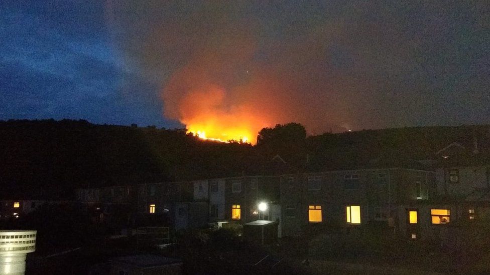 flames on the hill above Swansea
