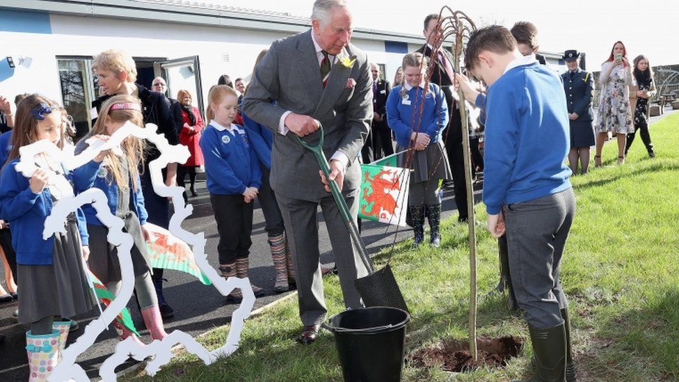 Prince Charles helped children from Blenheim Road Community Primary to plant a tree