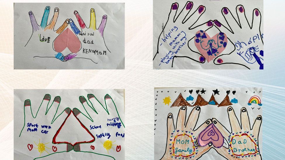 Artwork created by child refugees showing hands holding hearts and writing about their famlies
