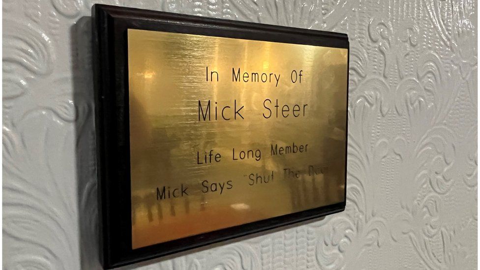 A brass plaque to the late Mick Steer