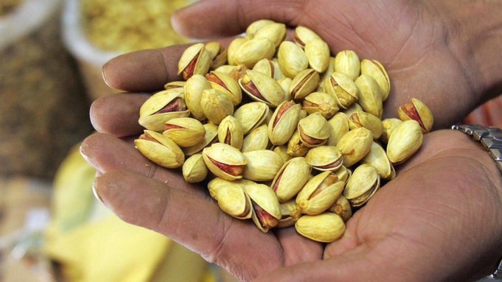 Close-up of a handful of pistachio nuts taken in Tehran in 2006.