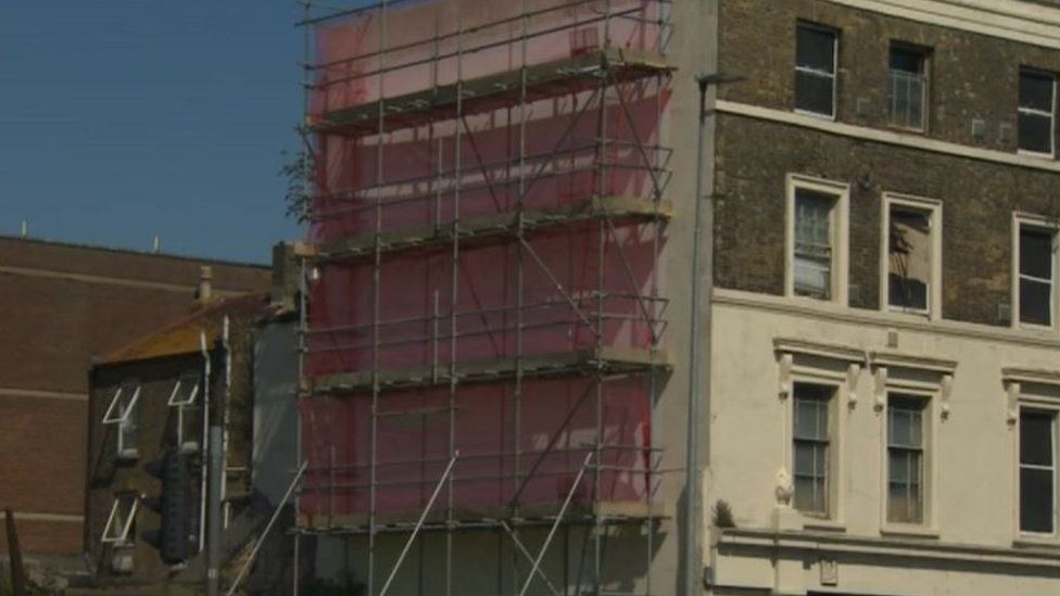 The building with scaffolding on