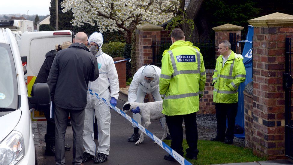 Forensic teams at the scene